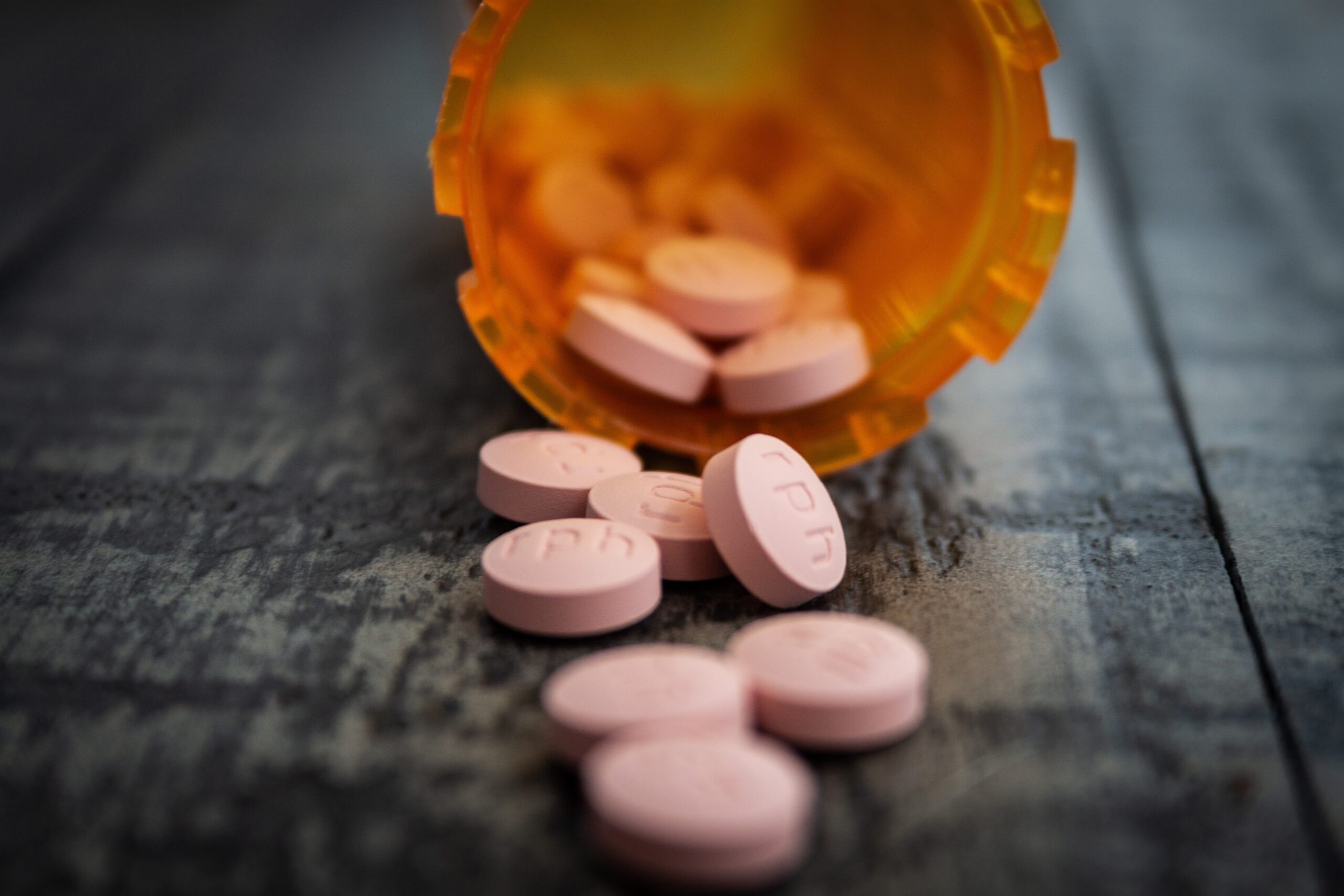 Pills falling out of a tube